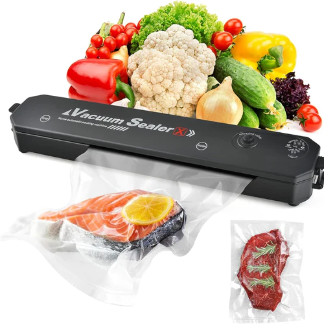 Selladora al vacío con verduras frescas, salmón y carne sellada